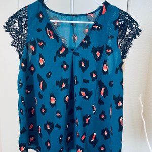 Deep teal patterned sleeveless v-neck blouse with crochet details. Women's large